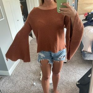 Rusty orange bell bottom sleeve sweater